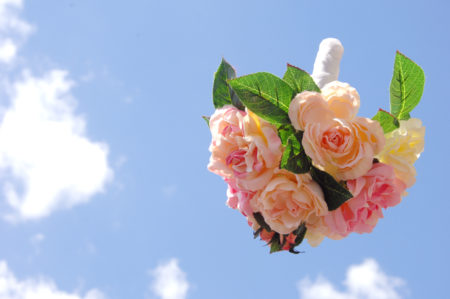 Bouquet of flowers tossed into the air