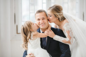 Bride and groom with daughter