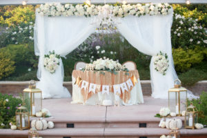 Sweetheart wedding table with white pumpkins