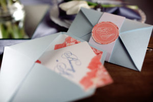 Fancy pink and blue wedding invitations