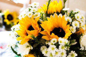 Large sunflower and white daisy centerpiece